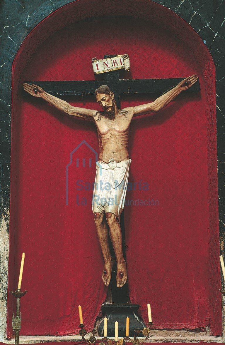 El Cristo de Santa Trigidia en el muro del evangelio de la iglesia