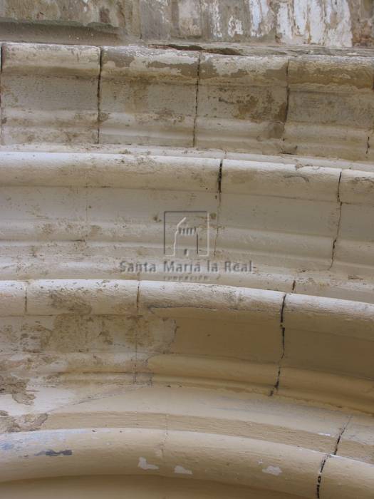 Detalle de las arquivoltas de la portada norte