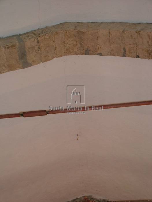 Detalle de la bóveda y un arco de la nave