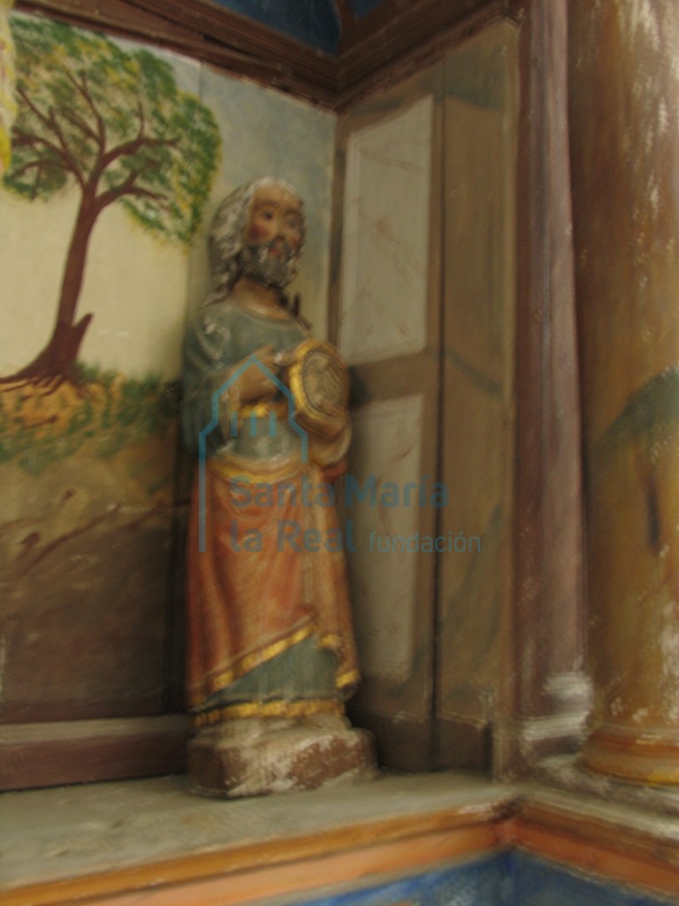 Escultura de San Juan Bautista en el retablo del lado norte
