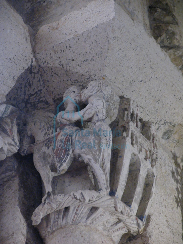 Capitel exterior del lado derecho del arco triunfal. Caballero despidiéndose de la dama