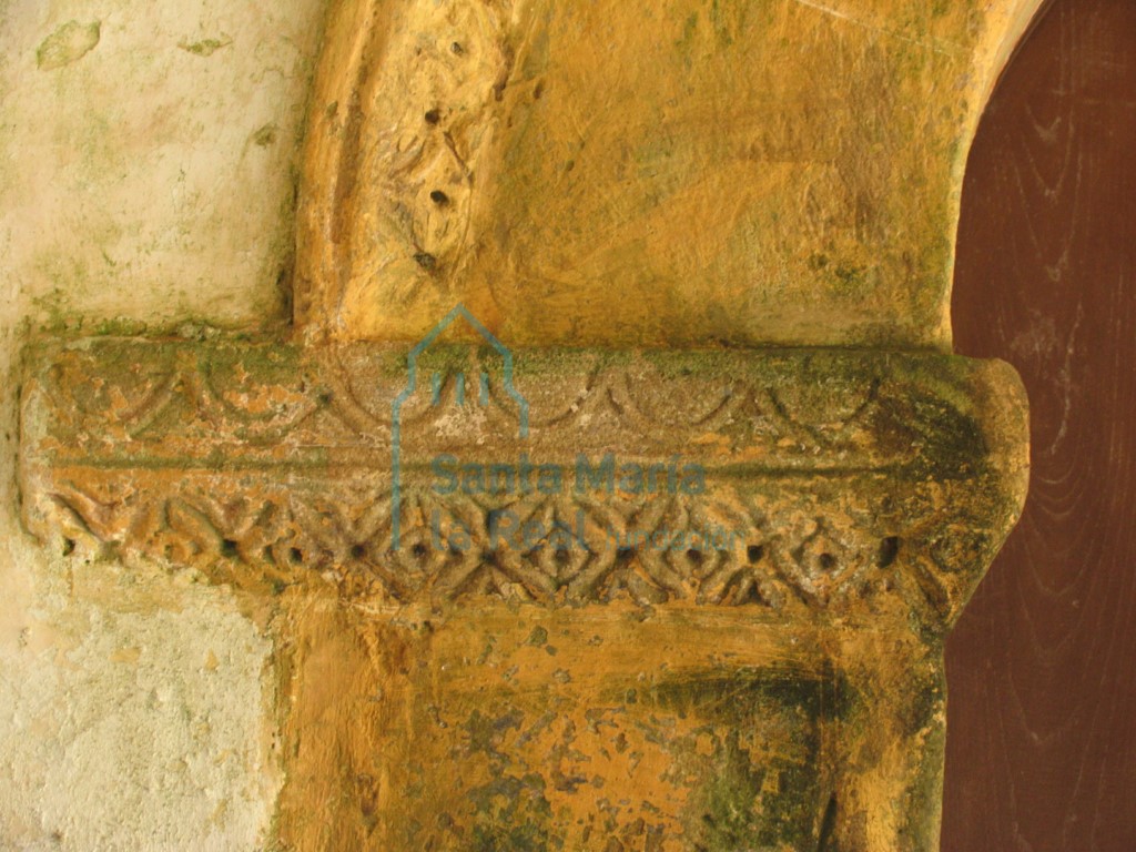 Detalle de la imposta norte de la portada occidental