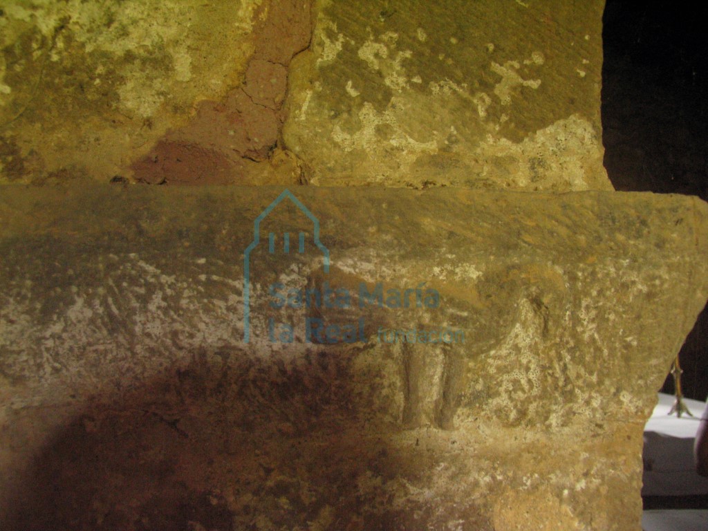 Detalle de la imposta norte del arco triunfal