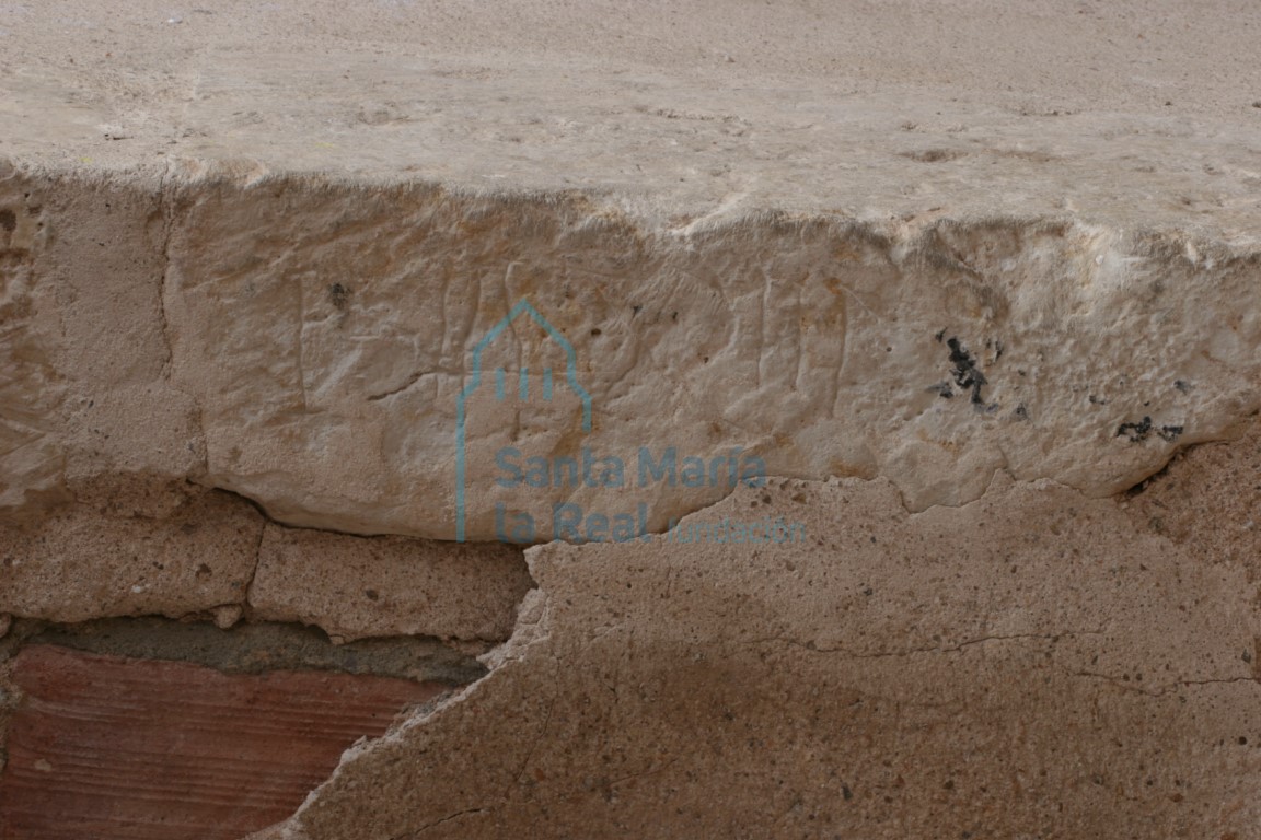 Detalle de una incripción en la piedra Detalle de una incripción en la piedra