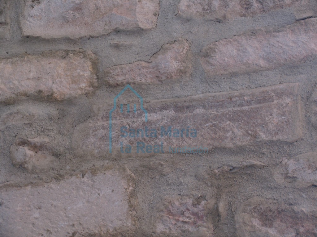 Elementos reaprovechados en el muro