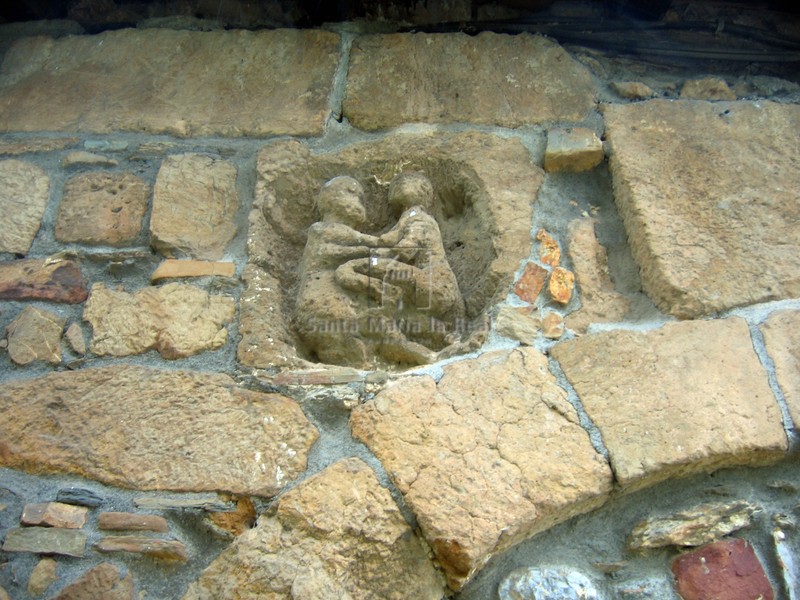 Escena de coito en un relieve del muro sur
